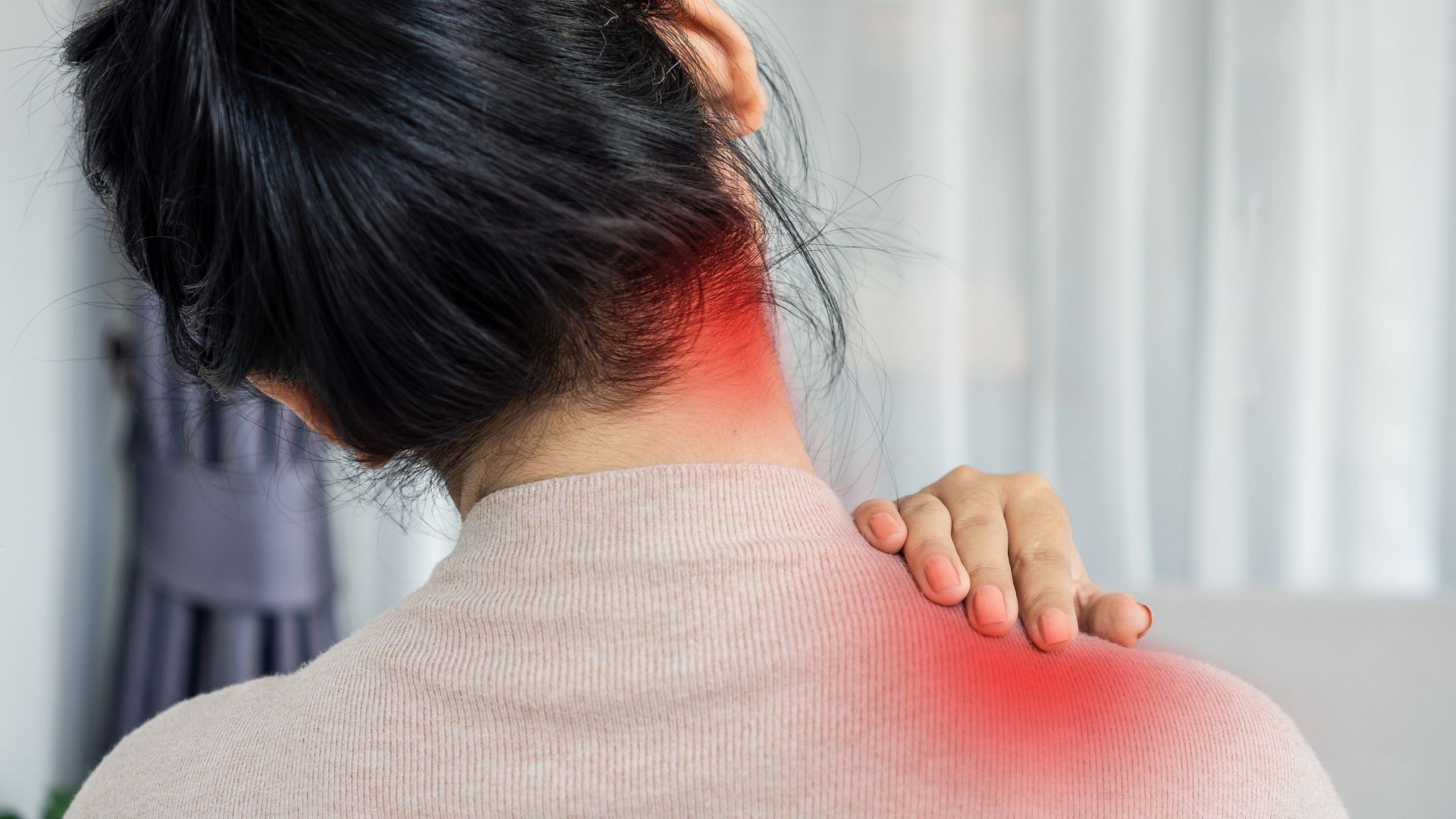 Office worker suffering from back pain in Manhattan